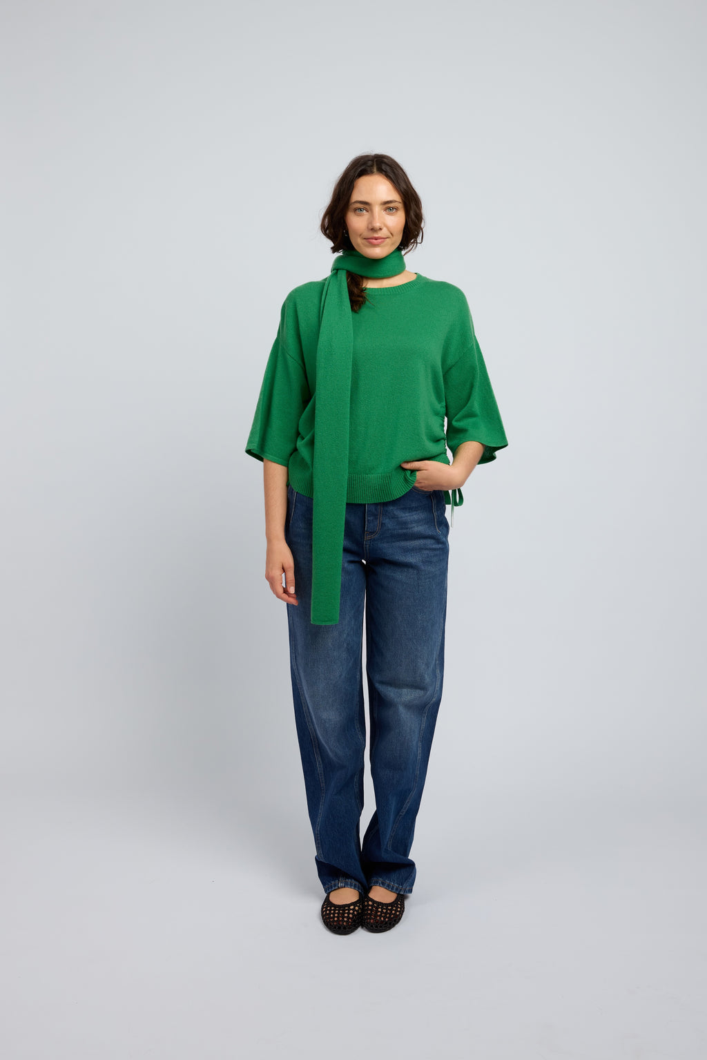 Emerald green cashmere drawstring tee on model front view luxury women knitwear