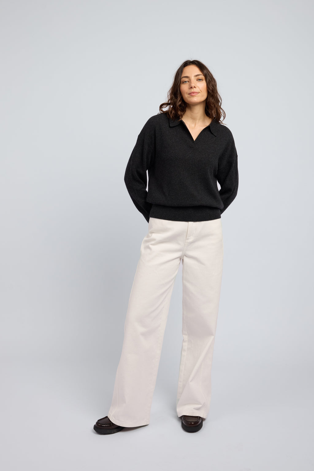 Luxury charcoal cashmere polo knit jumper styled with cream trousers women